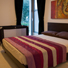 Maiella View Villa - Downstairs master bedroom with baby cot facilities
